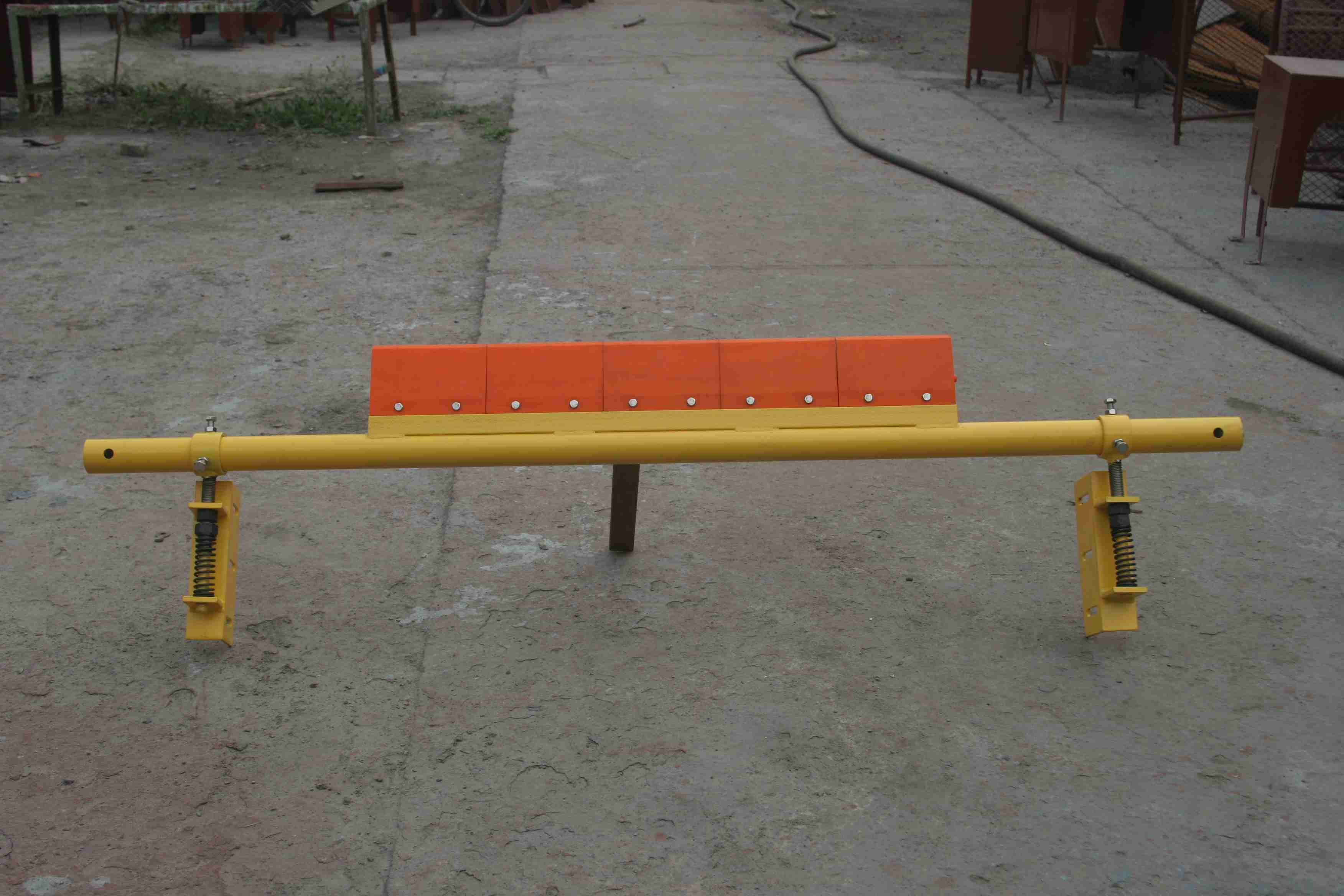 Scrapers for conveyor belts